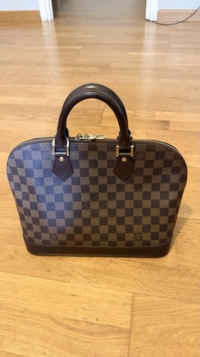 Louis vuitton hand bag - louis,